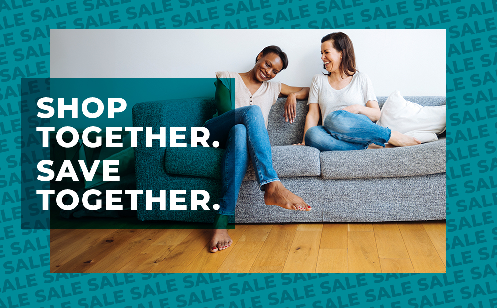 Woman on floor listening to music with spilled coffee next to her. 